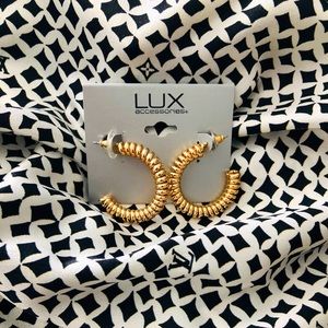 Gold hoops with a twist !